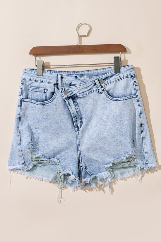 Light blue acid washed raw edge crossover denim shorts