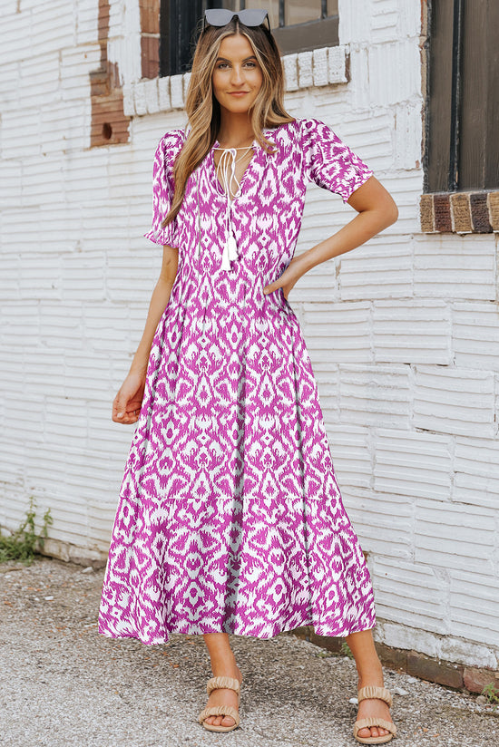 Long relaxed dress with geometric print and pink v collar