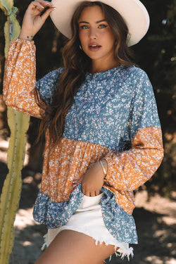 Orange blouse with flowers and color blocks *