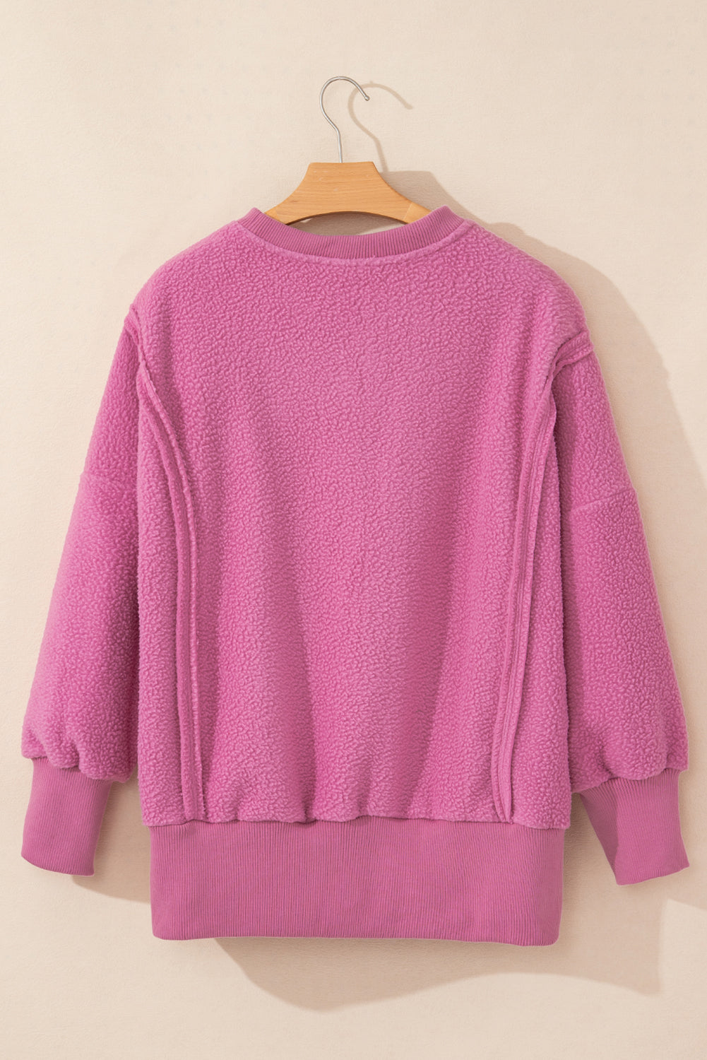 Sudadera de gran tamaño de color rosa sherpa rosa costado