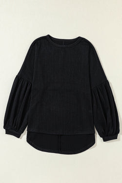 Black long puff sleeve top in faux knit jacquard