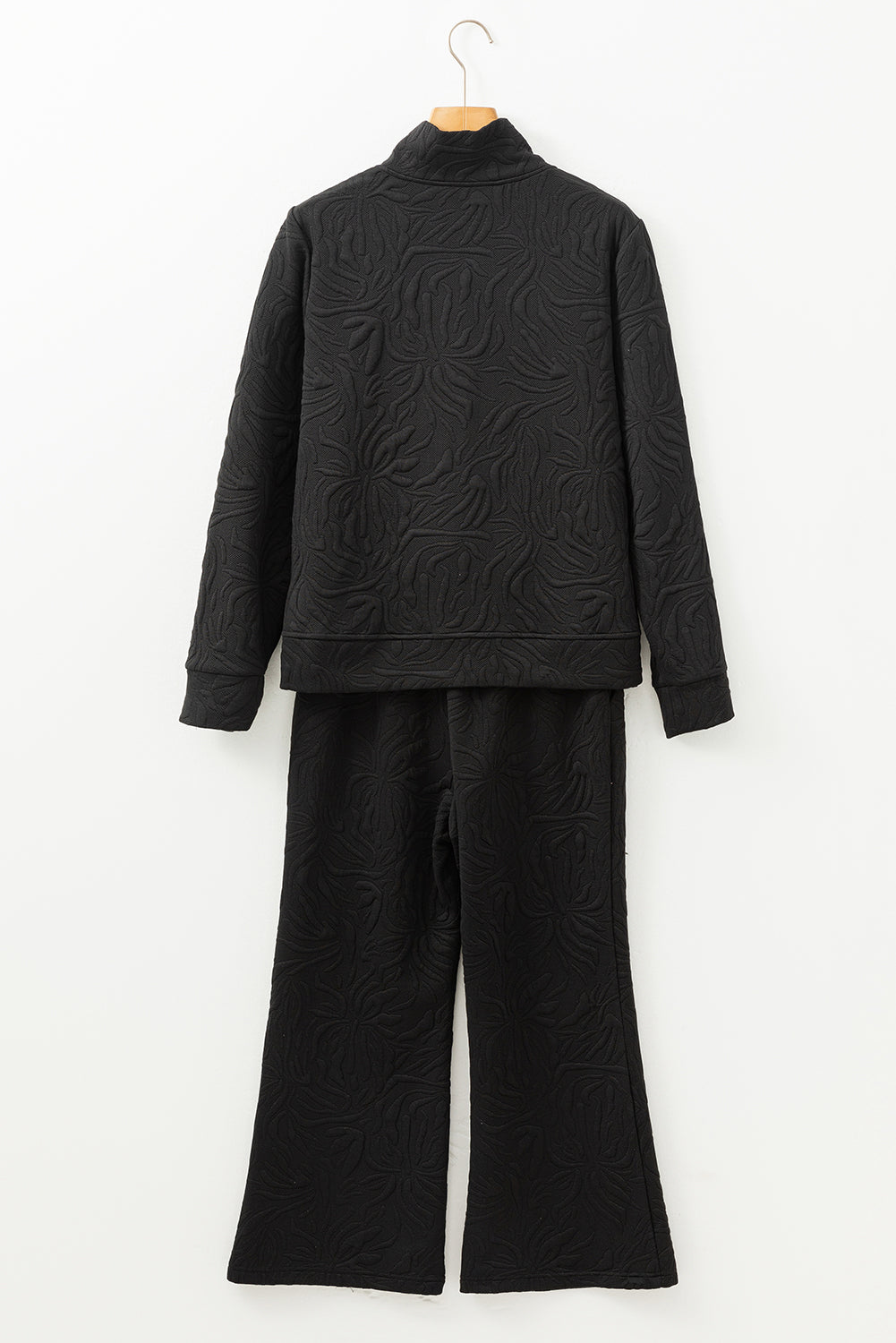 Ensemble noir texturé en jacquard avec haut zippé et pantalon court