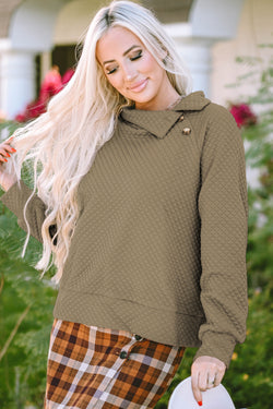 Apricot quilted sweatshirt with button-down neckline and stand-up collar