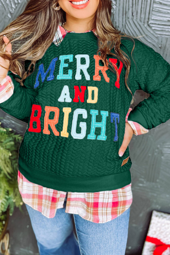 Bright and cheerful cable knit sweatshirt in blackish green