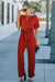 Bright red belted wide leg jumpsuit