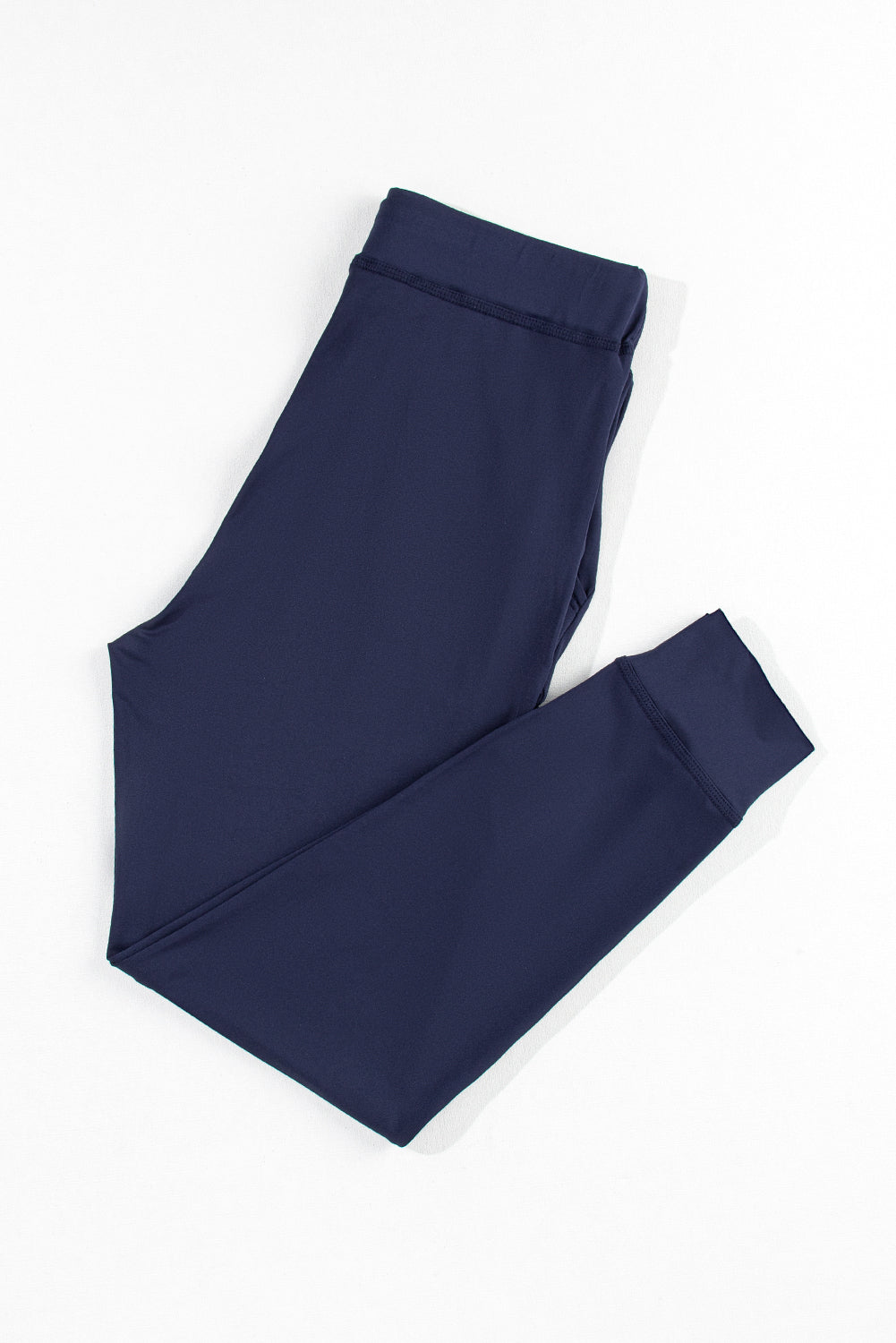 Navy blue jogging pants with pockets and drawstring waist