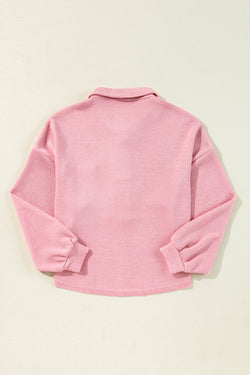 Haut Henley con cuello de punto picado rosa con bolsillo para el pecho