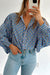 Surprised shirt buttoned with frowned and abstract blue sky