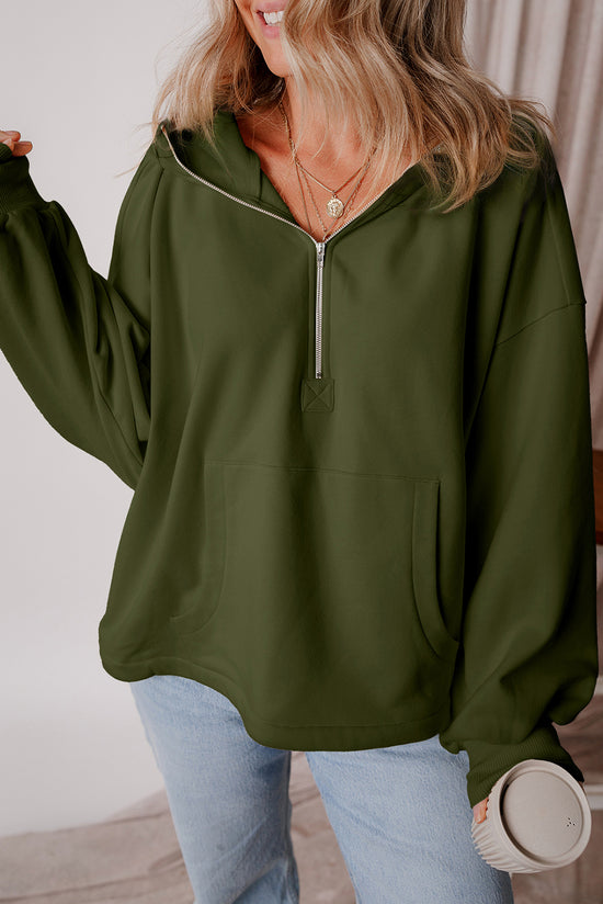 Loose-fitting half-zip hoodie with fleece-lined kangaroo pockets in moss green